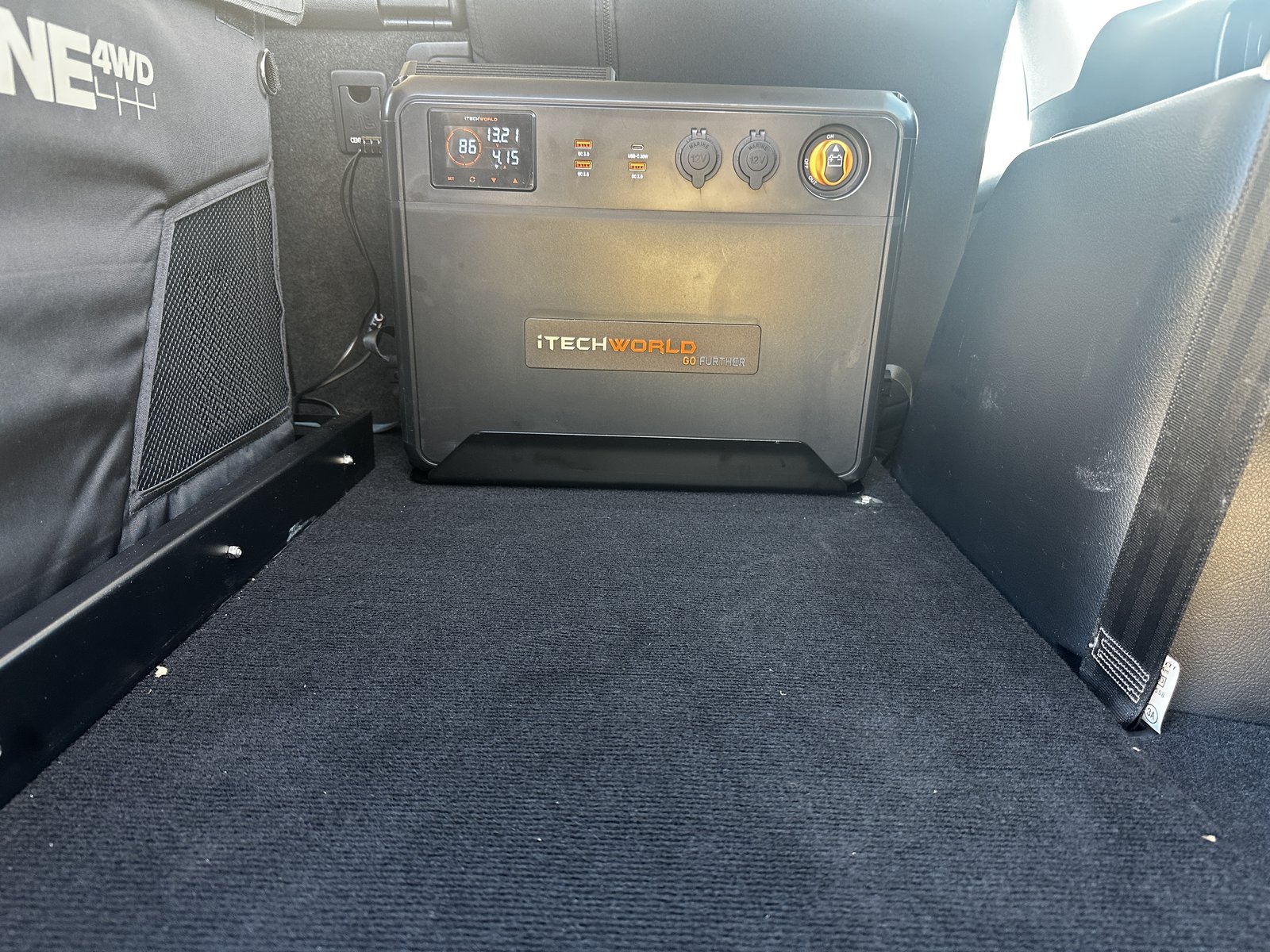 iTechWorld battery box installed in the rear of the Prado alongside the Dune 4WD fridge in its insulating bag