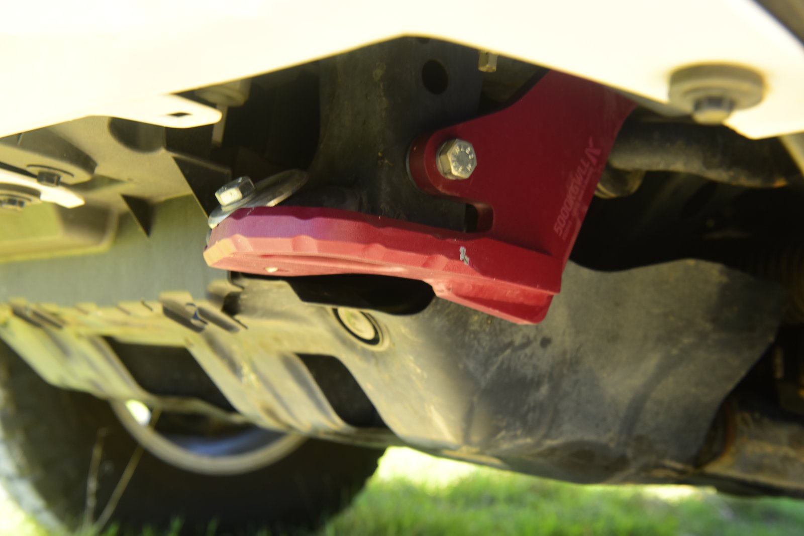 Vehicle and Camping Gear Red Kaon 5000kg rated recovery point bolted to the front of a Toyota Prado